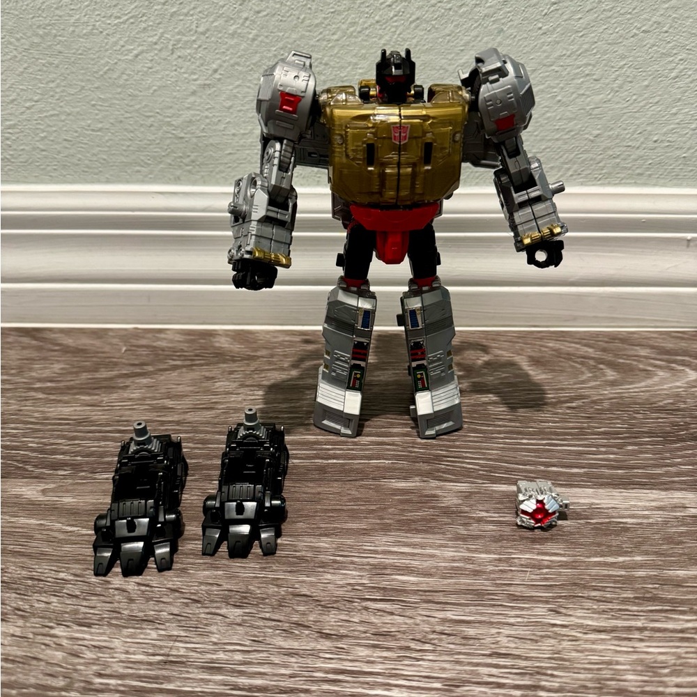 Transformers Generations Power of the Primes Voyager Class Grimlock figure.